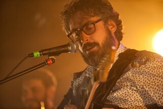 Un primo piano di Dario Brunori