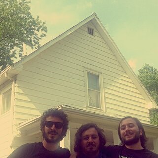 6 CRTVTR bombing the house in American Football LP cover.JPG