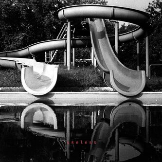 Copertina dell'album USELESS, di The_Mills