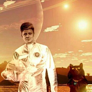 DJoNemesis with Lilly, his sacred female cat from Orion's Belt.